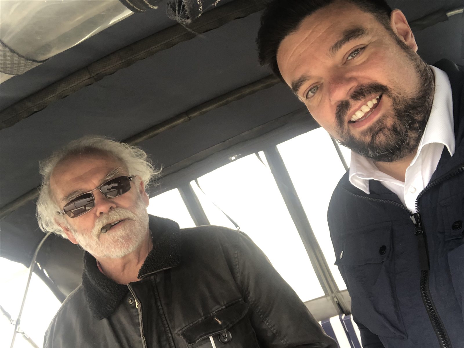 A personal photograph of Mark with his friend Julian, remembered as a kind, warm and much-loved man.